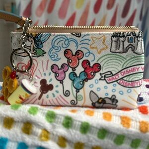 Disney Dooney and Bourke scribble cosmetic bag and Disneyland snacks keychain